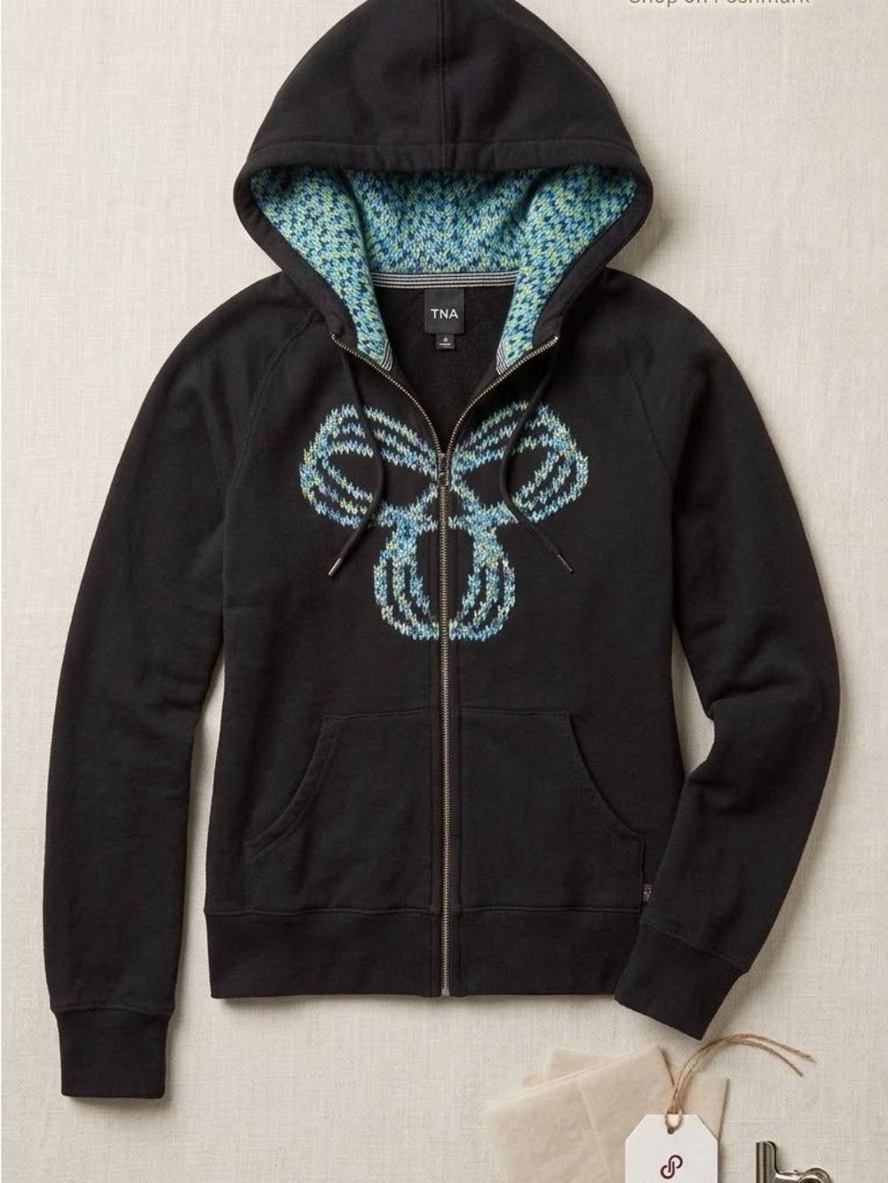 TNA Black Zip-Up Hoodie with Blue-Green Patterned Chest & Hood